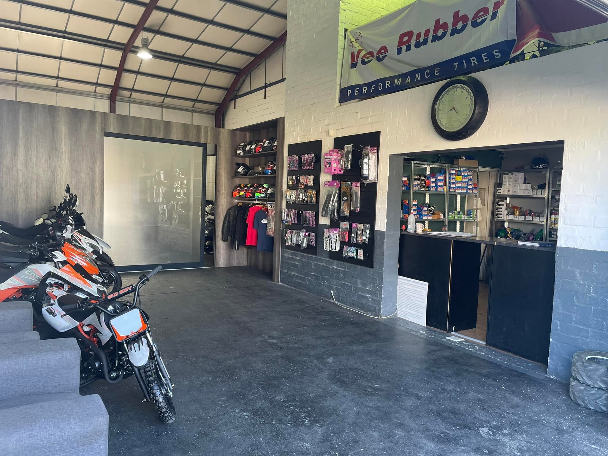 Motorcycle workshop photo placeholder — replace with a photo of the workshop